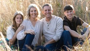 Smith family professional photo: when refinancing to afford life catches up.